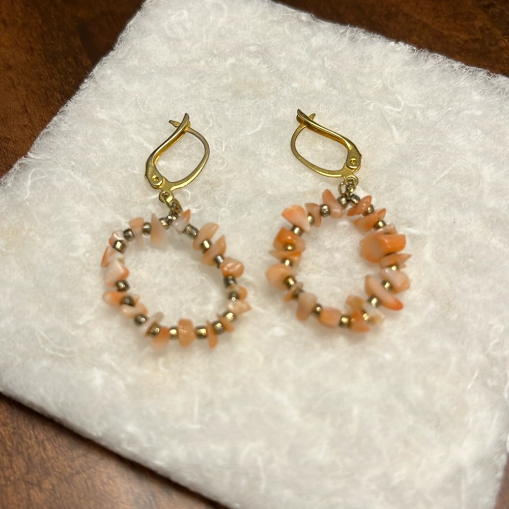 Coral earrings.